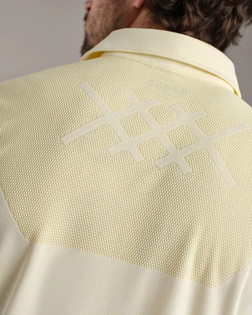 Rhone Men's Cross-Court Polo Shirt - Yellow Dawn